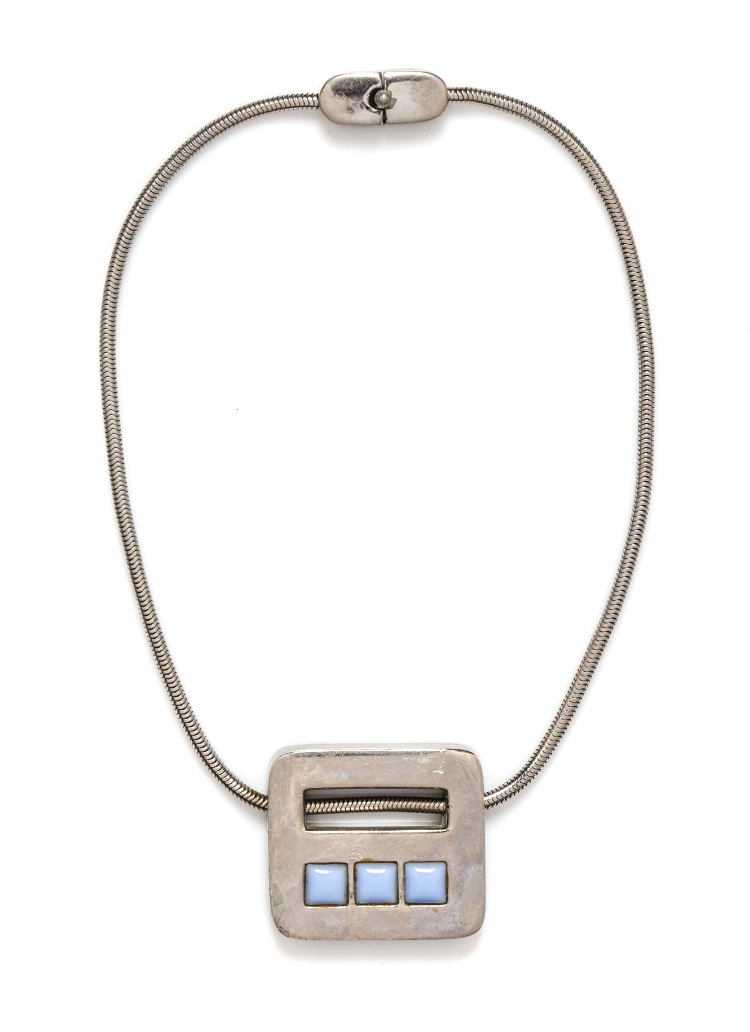A Pierre Cardin Silvertone Pendant Necklace,