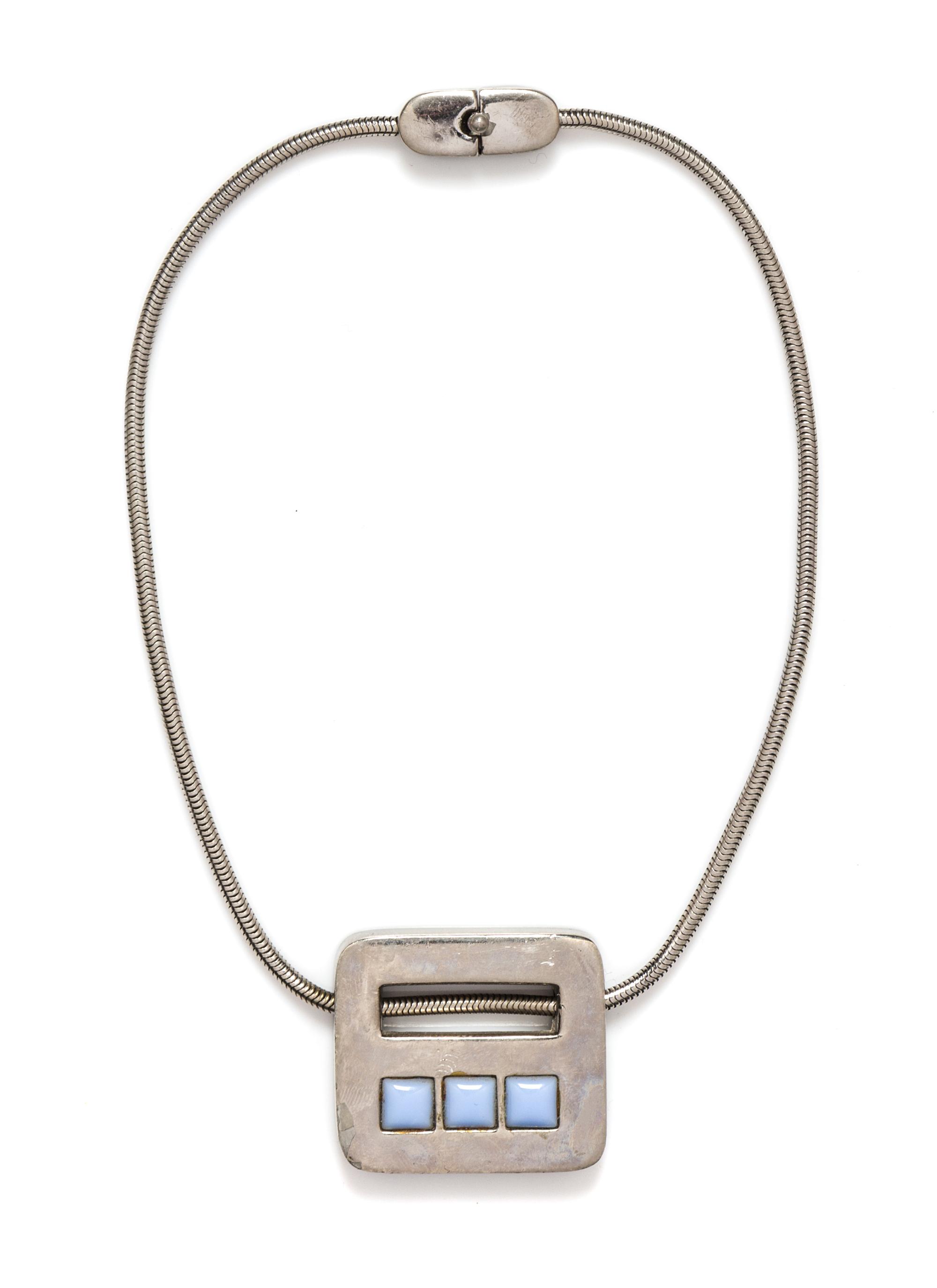 A Pierre Cardin Silvertone Pendant Necklace,