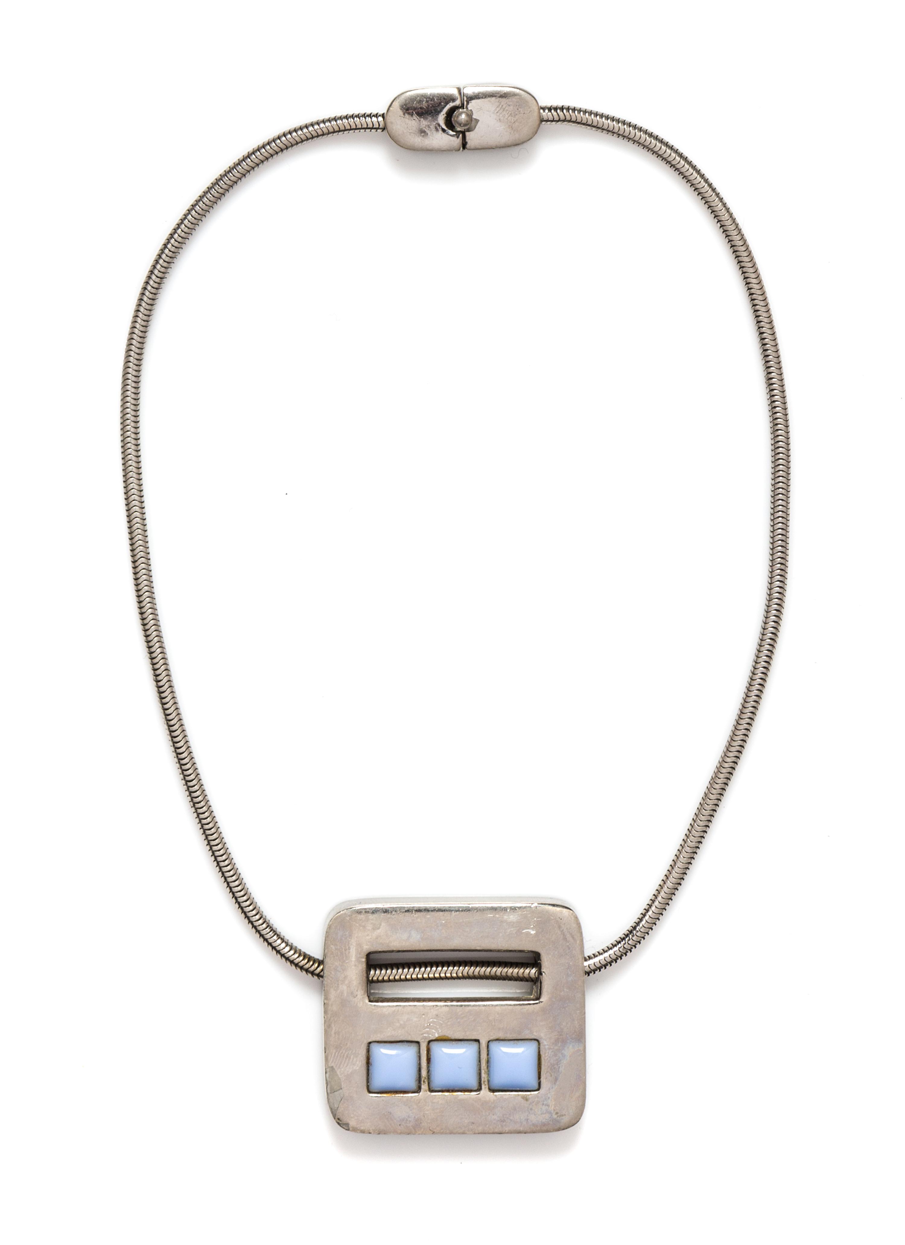 A Pierre Cardin Silvertone Pendant Necklace,
