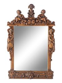 A Renaissance Revival Carved Oak Mirror