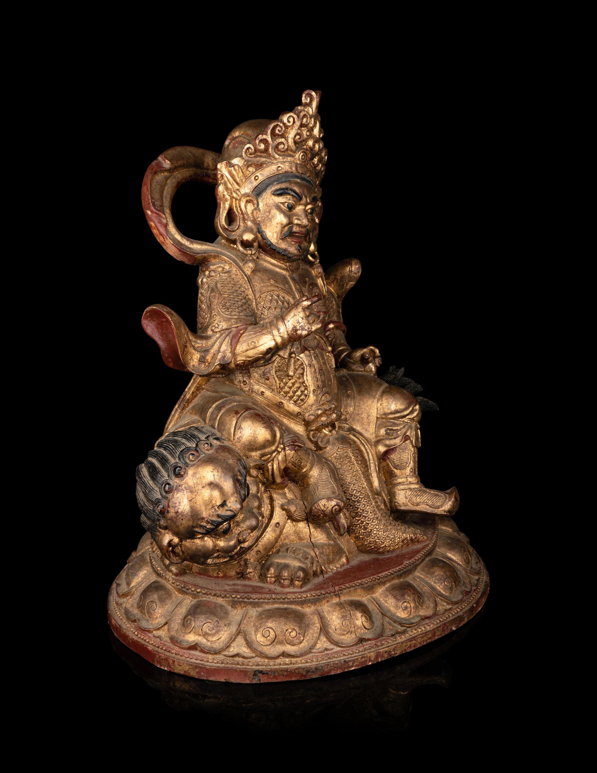 A Large and Rare Sino-Tibetan Gilt Lacquer Wood Figure of Vaishravana