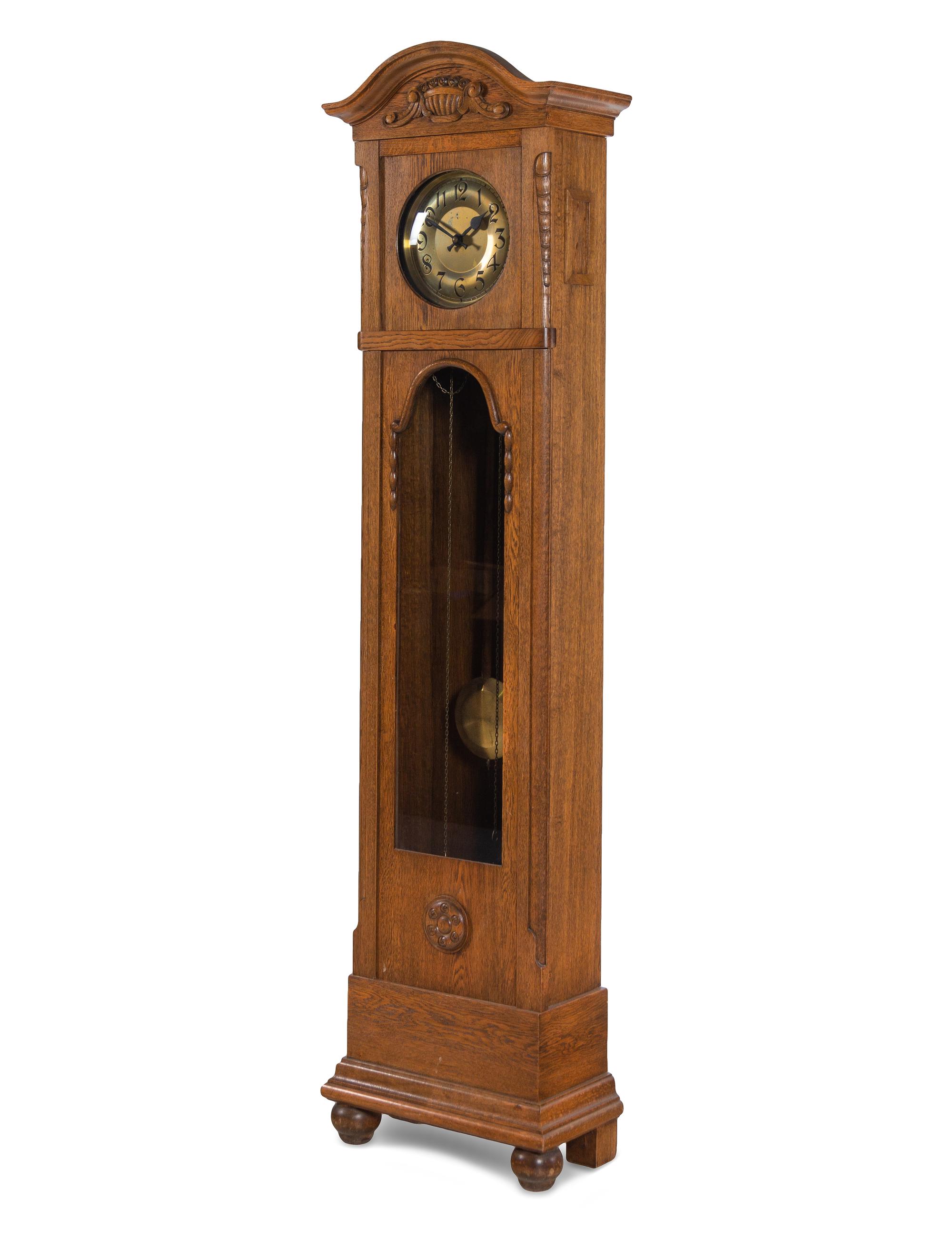 A Continental Oak Tall Case Clock