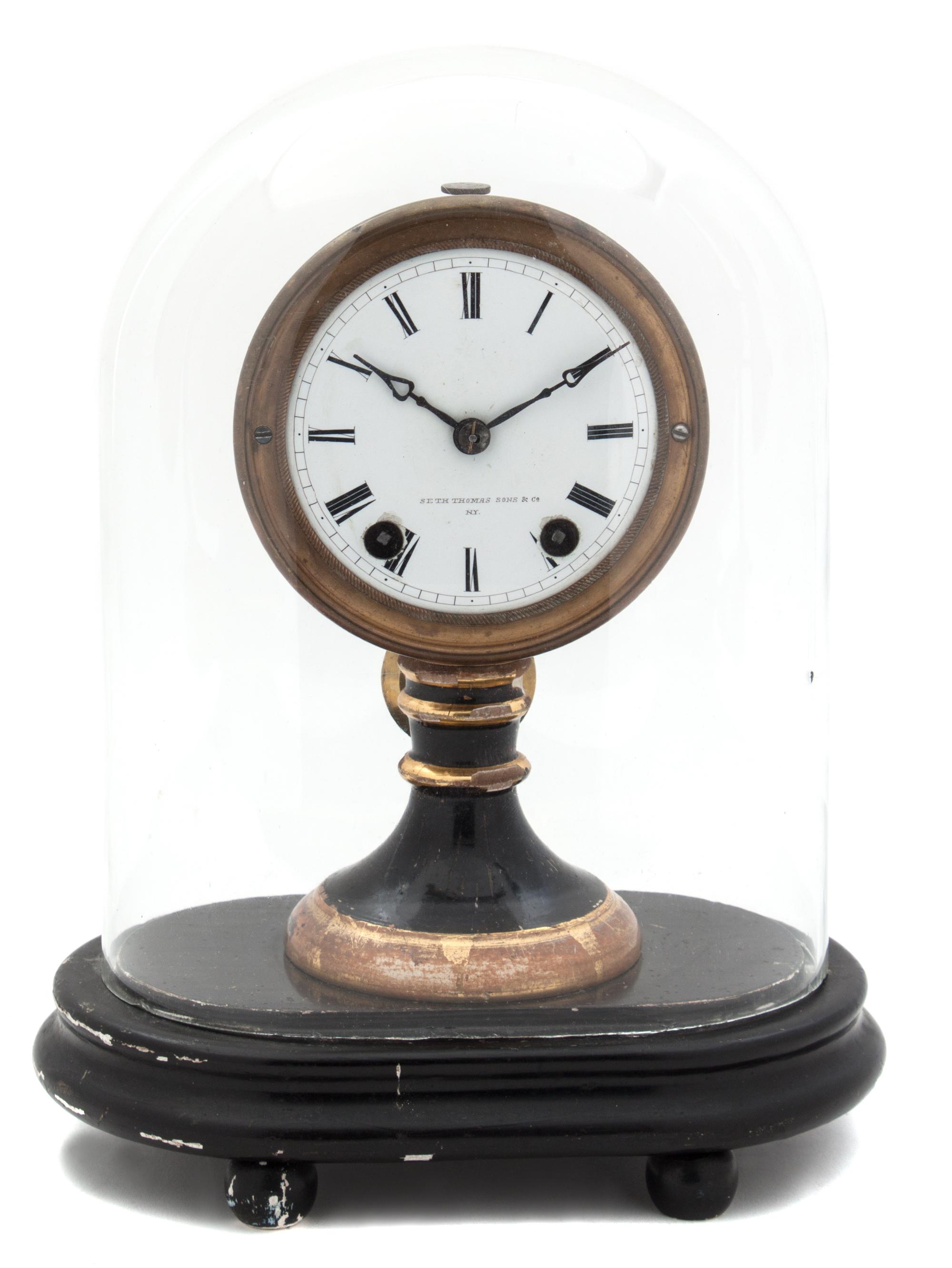 A Seth Thomas Gilt Metal Candlestick Clock Height of dust dome 11 1/4 inches. — 19TH CENTURY