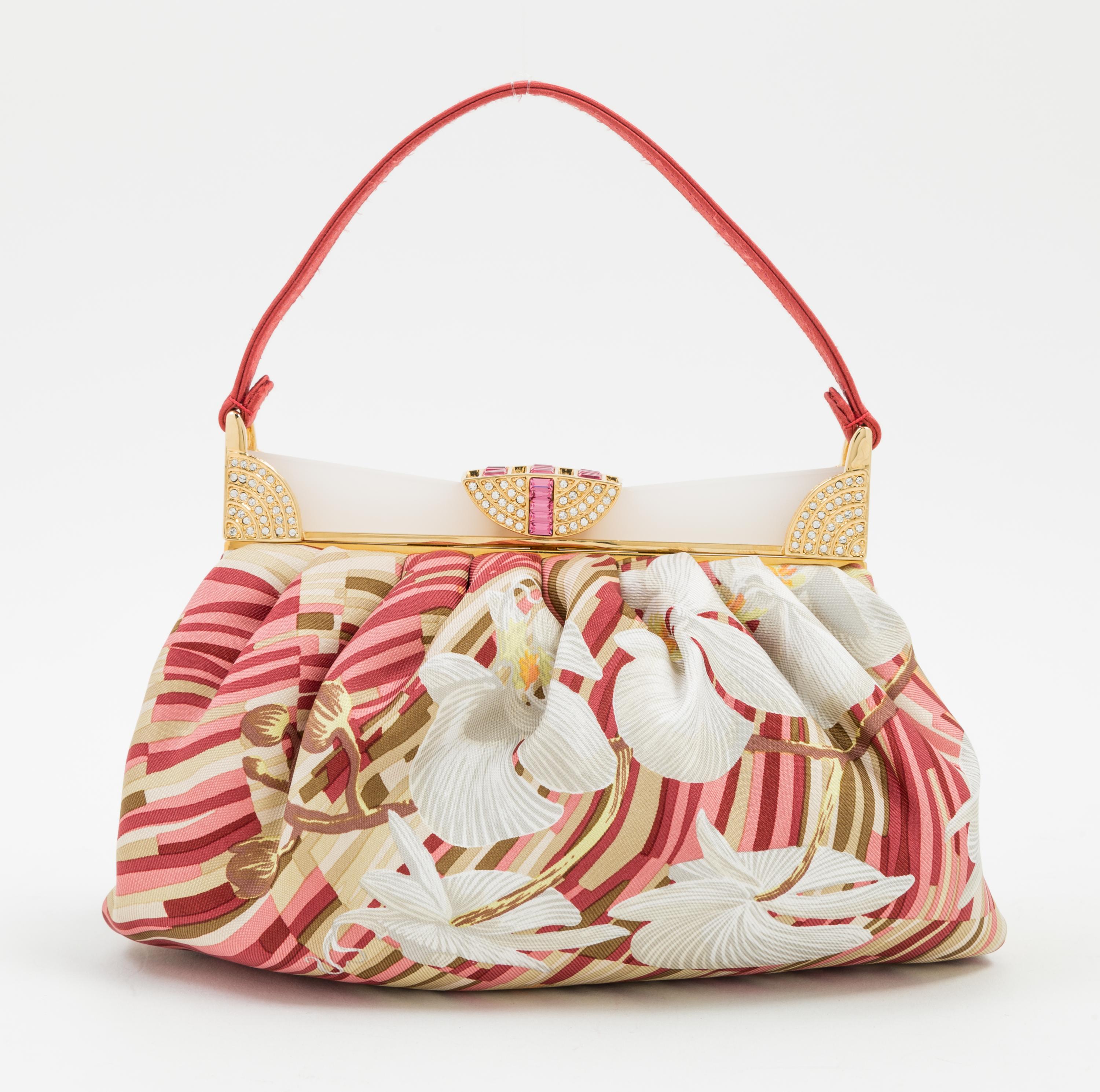 A Judith Leiber Silk Floral Handbag, 7" x 5.5" x 1.5".