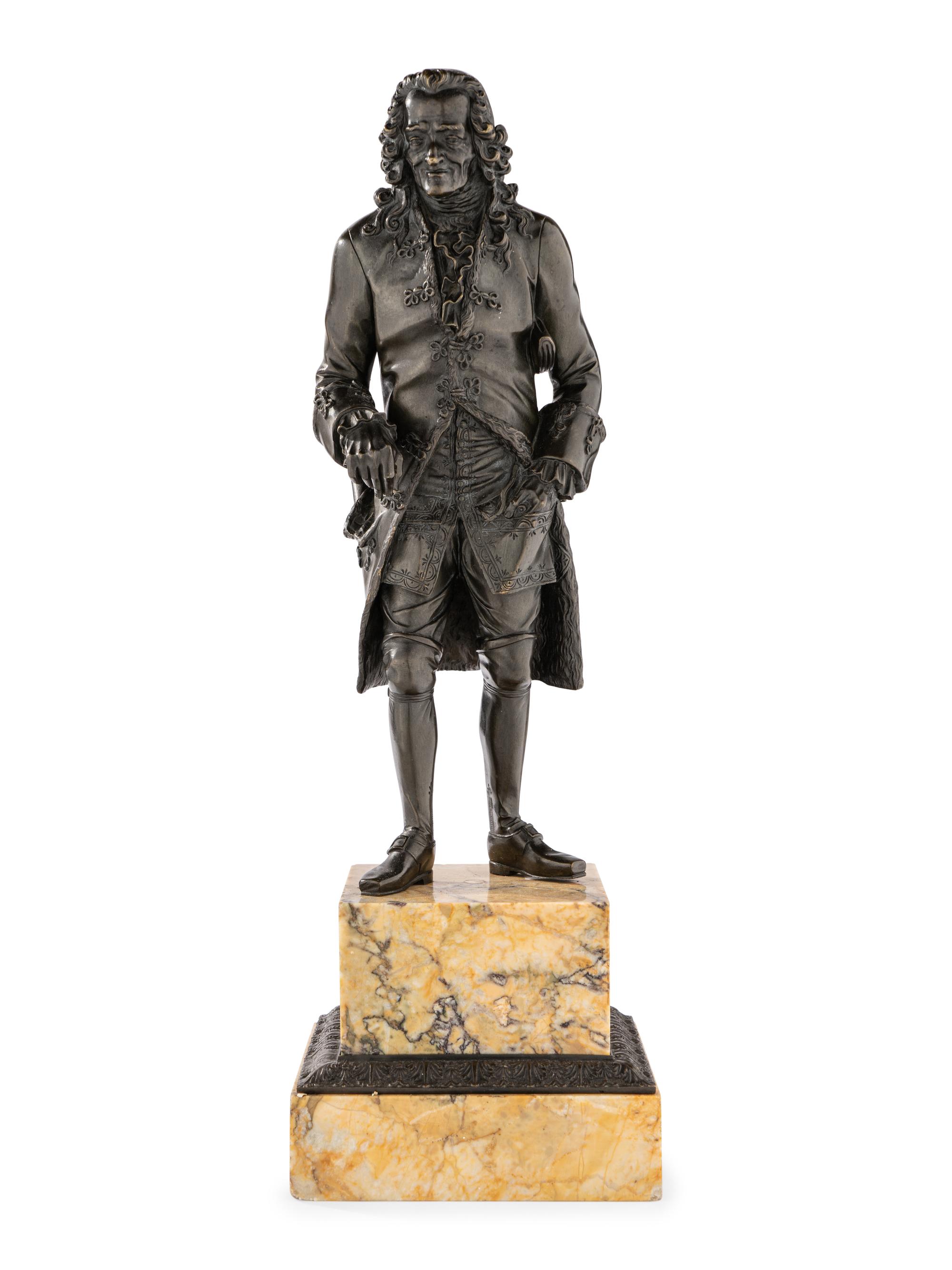 A Pair of French Bronze and Sienna Marble Sculptures of Voltaire and Rousseau