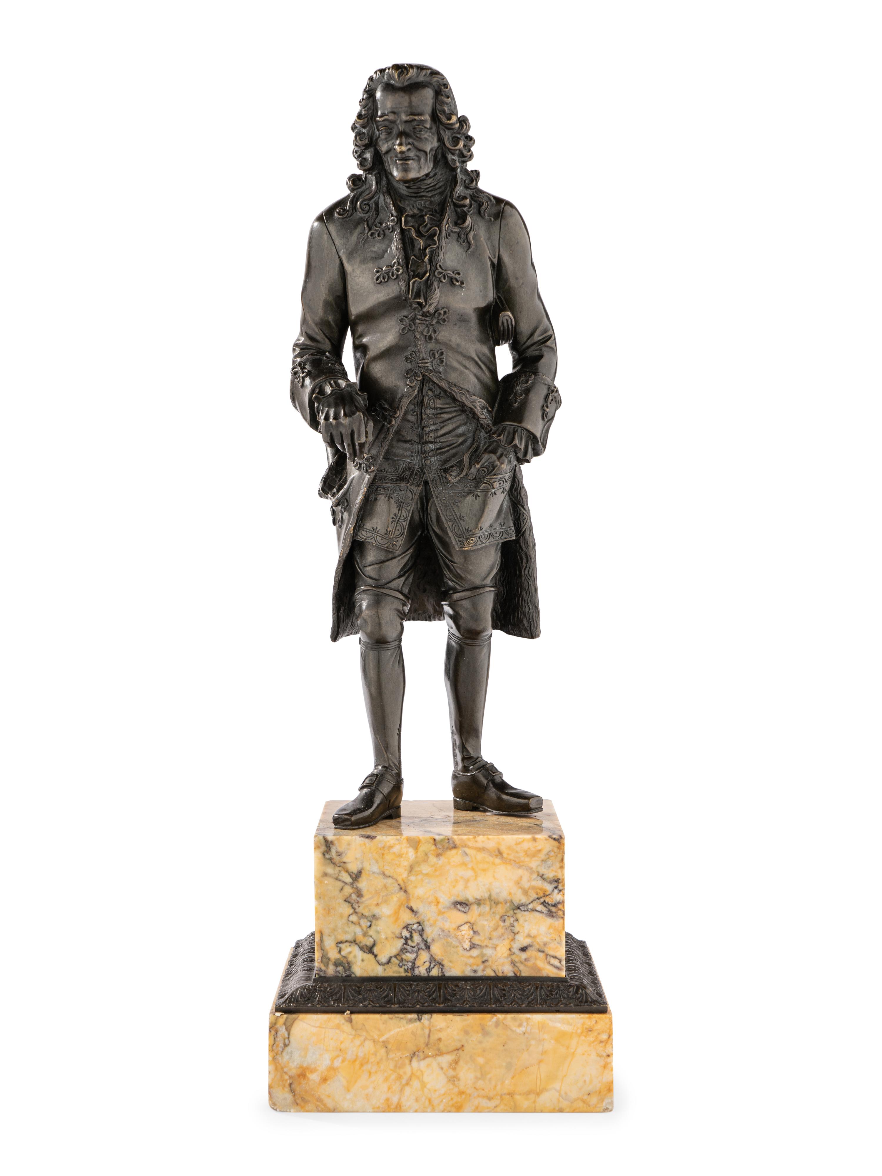 A Pair of French Bronze and Sienna Marble Sculptures of Voltaire and Rousseau