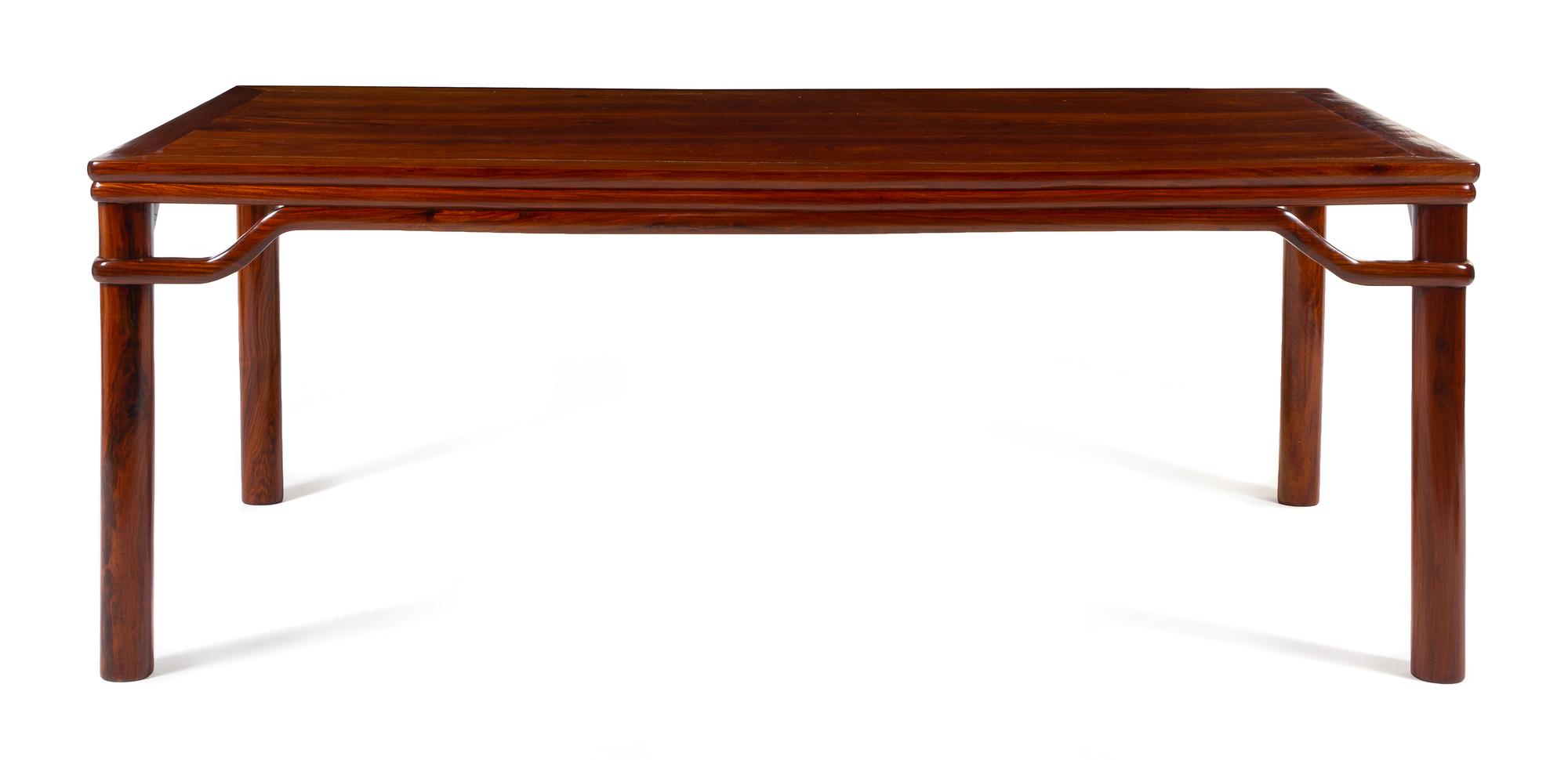 A Chinese Huanghuali Scroll Table, Huazhuo Height 30 x width 78 1/4 x depth 40 1/2 inches. — QING DYNASTY (1644-1911)