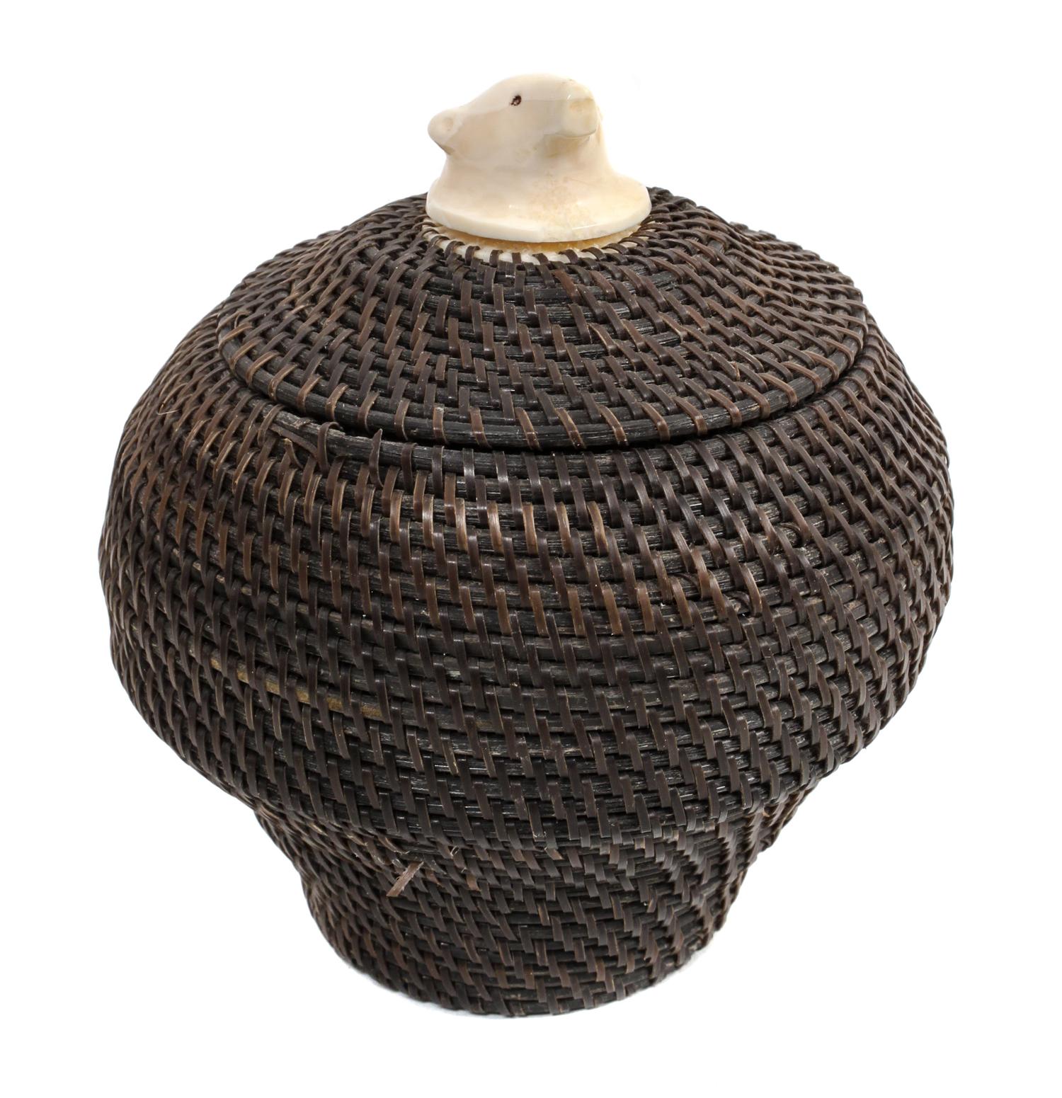 An Eskimo Baleen Basket Height 4 inches.