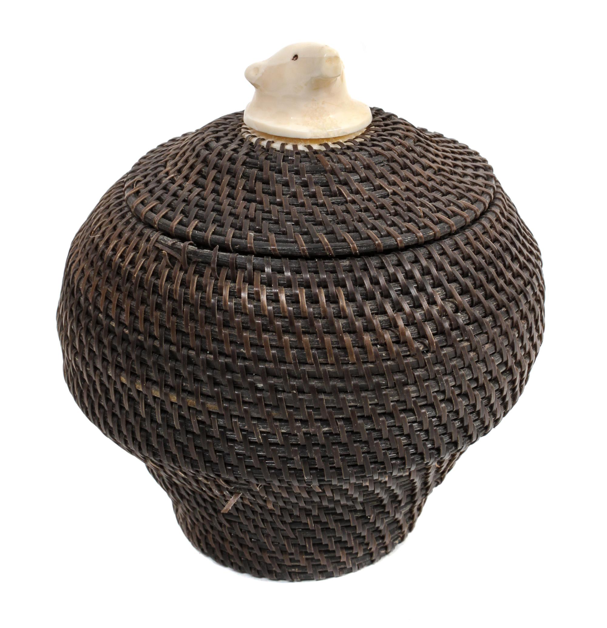 An Eskimo Baleen Basket Height 4 inches.