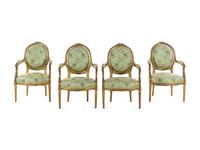 A Set of Four Louis XVI Style Carved Giltwood Fauteuils