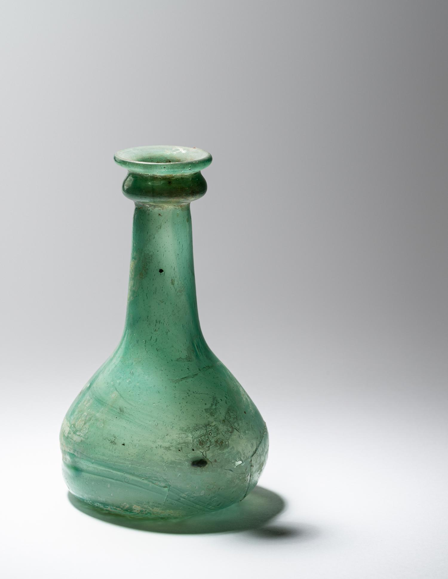 A Parthian Green Glass Bottle