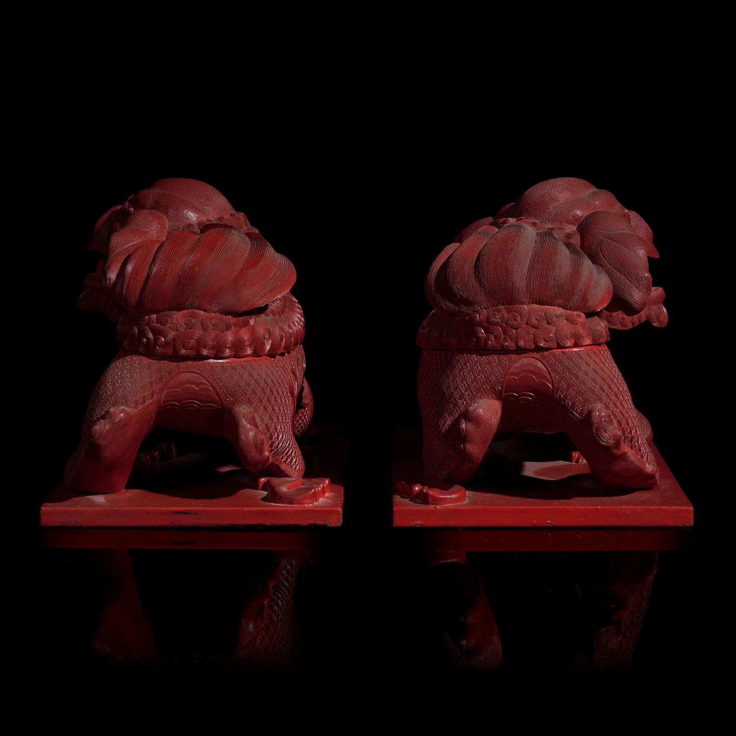 A Pair of Chinese Cinnabar Lacquer 'Lions' Boxes, 20th Century 剔紅佛獅形蓋盒一對