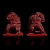 A Pair of Chinese Cinnabar Lacquer 'Lions' Boxes, 20th Century 剔紅佛獅形蓋盒一對