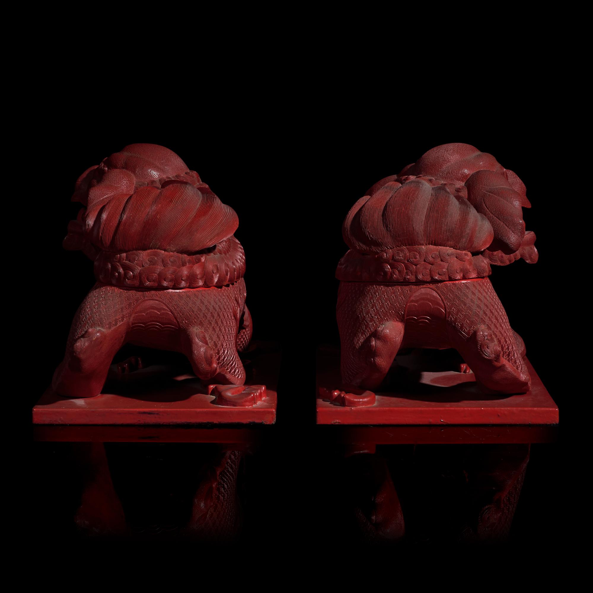 A Pair of Chinese Cinnabar Lacquer 'Lions' Boxes, 20th Century 剔紅佛獅形蓋盒一對