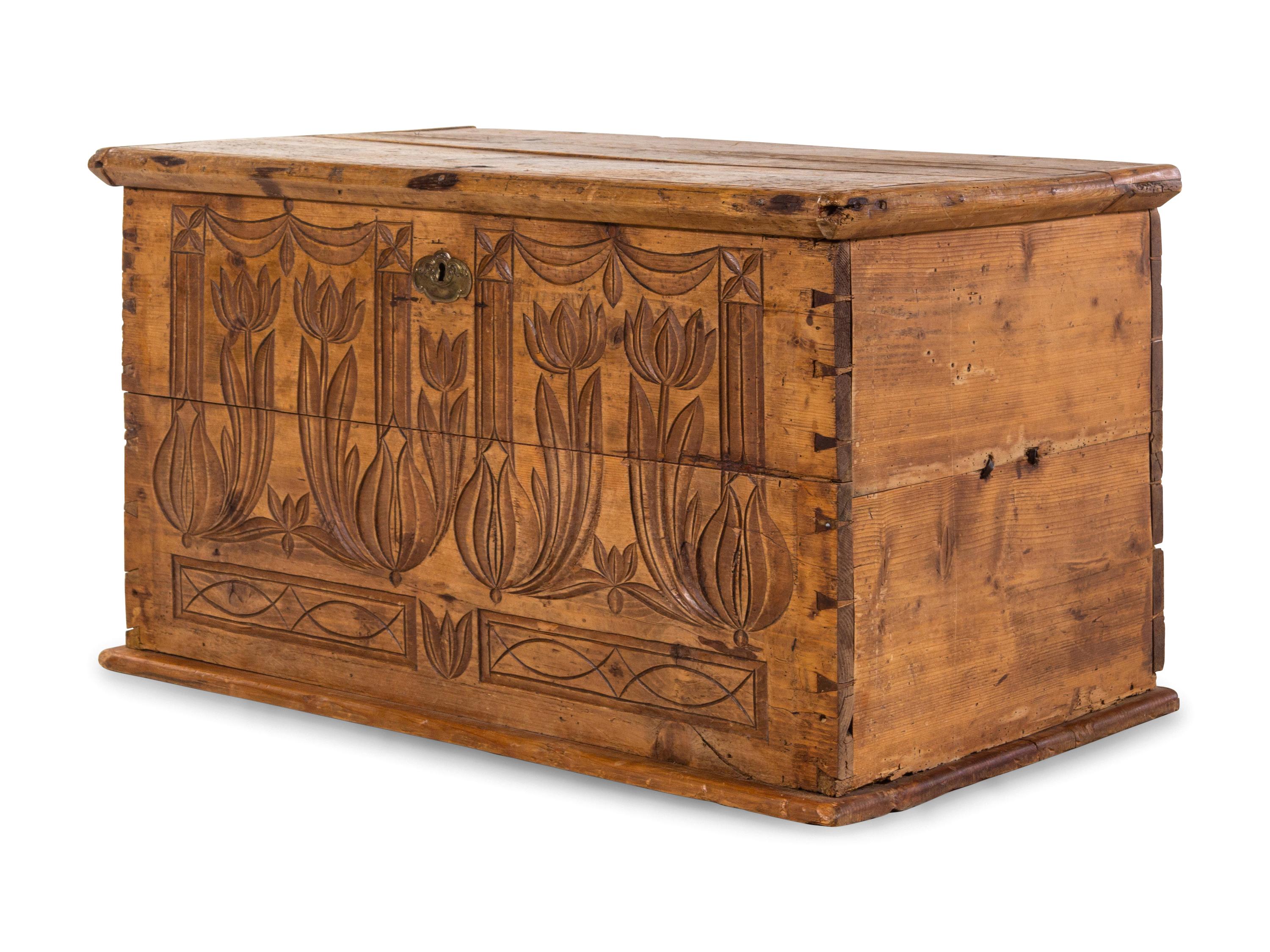 A Carved Pine Blanket Chest