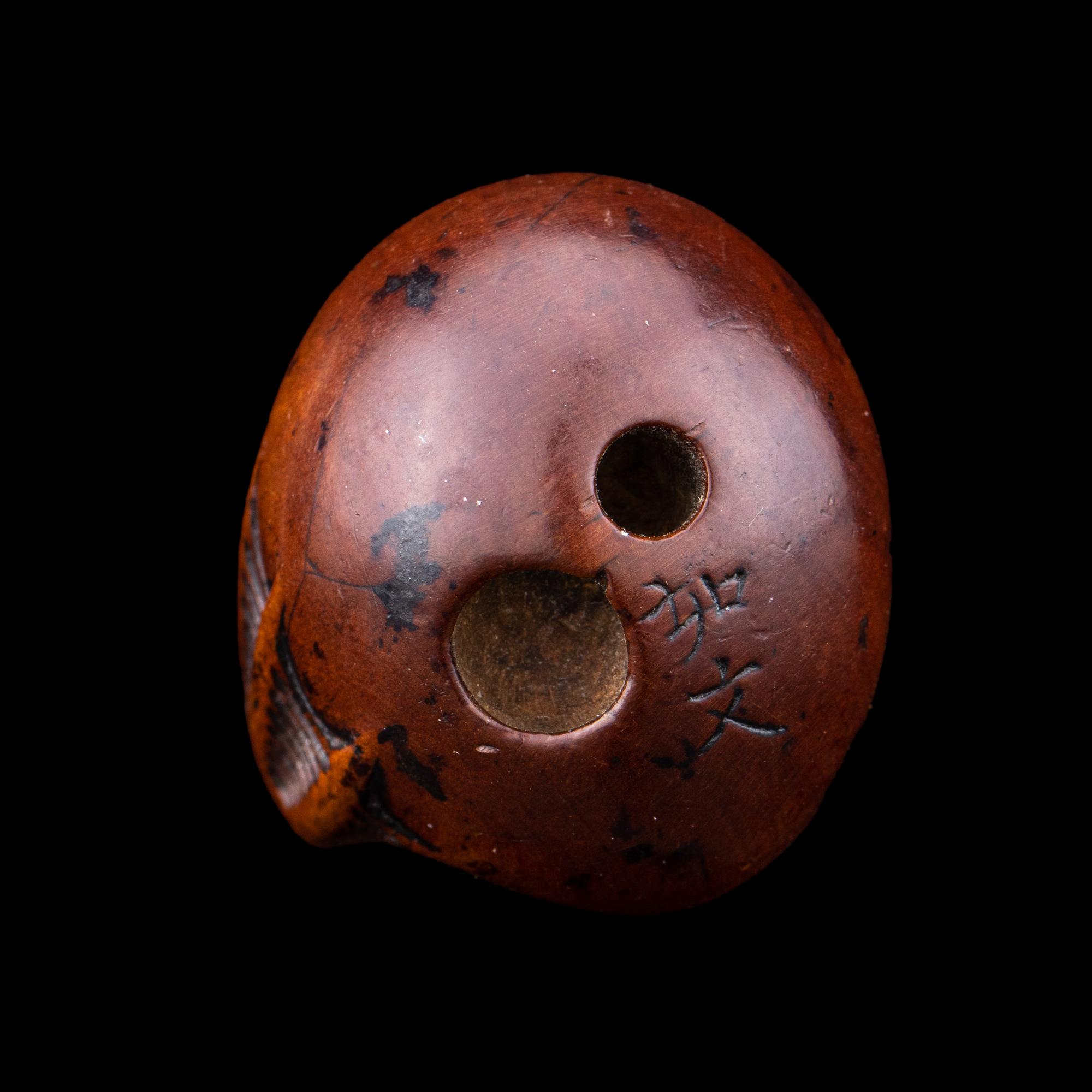 A Japanese Wood Netsuke of Hatching Tengu