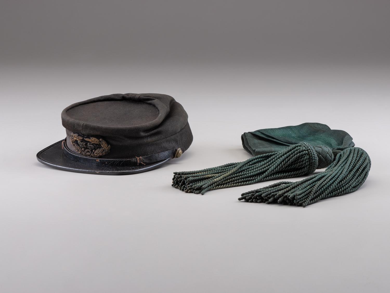 [CIVIL WAR]. Kepi and sash identified to Surgeon Hermann Ideler, 45th New York Infantry and 15th New York Heavy Artillery.