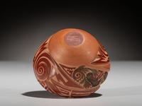 Carved Polychrome Pottery Vase