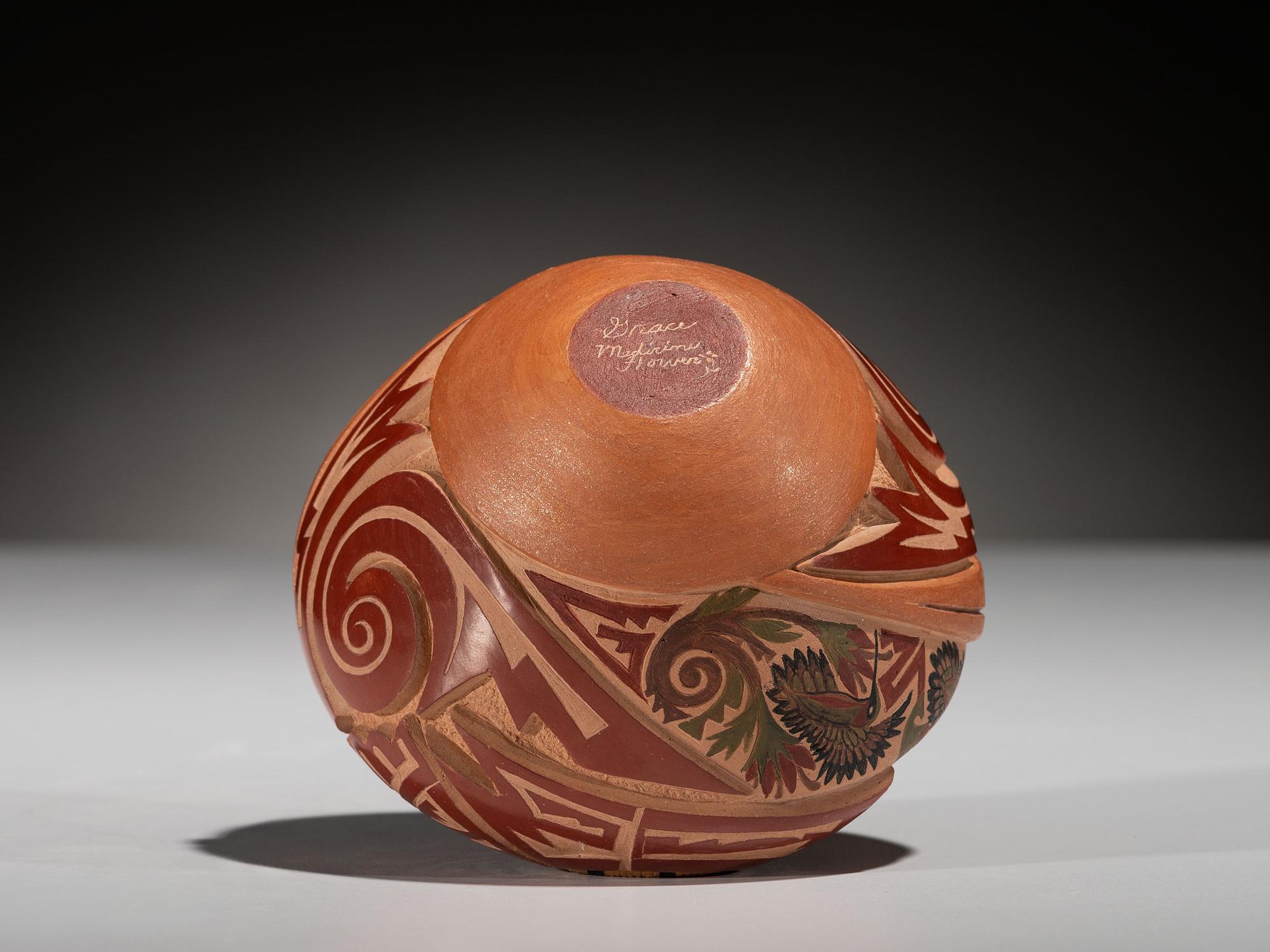 Carved Polychrome Pottery Vase