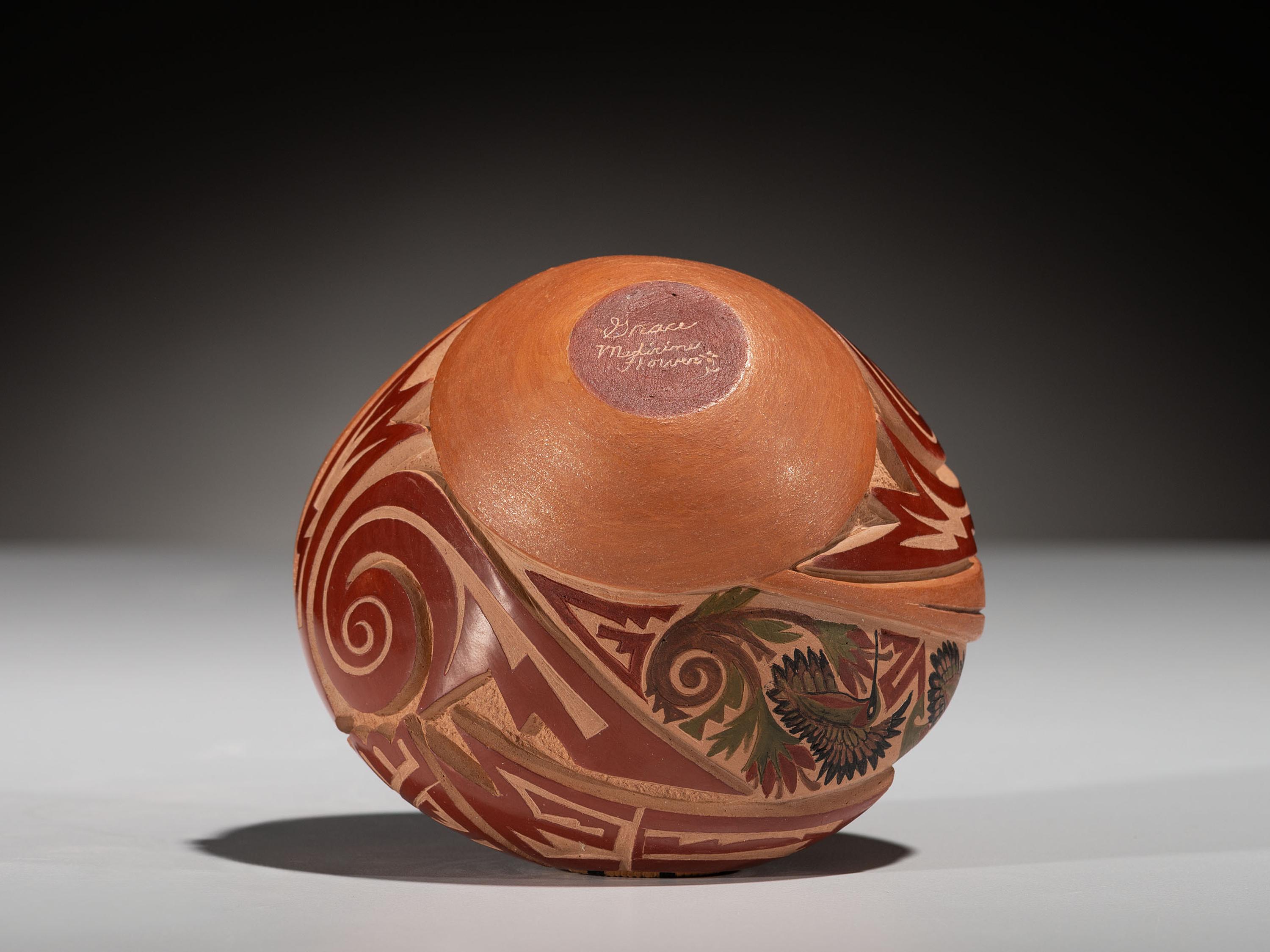 Carved Polychrome Pottery Vase