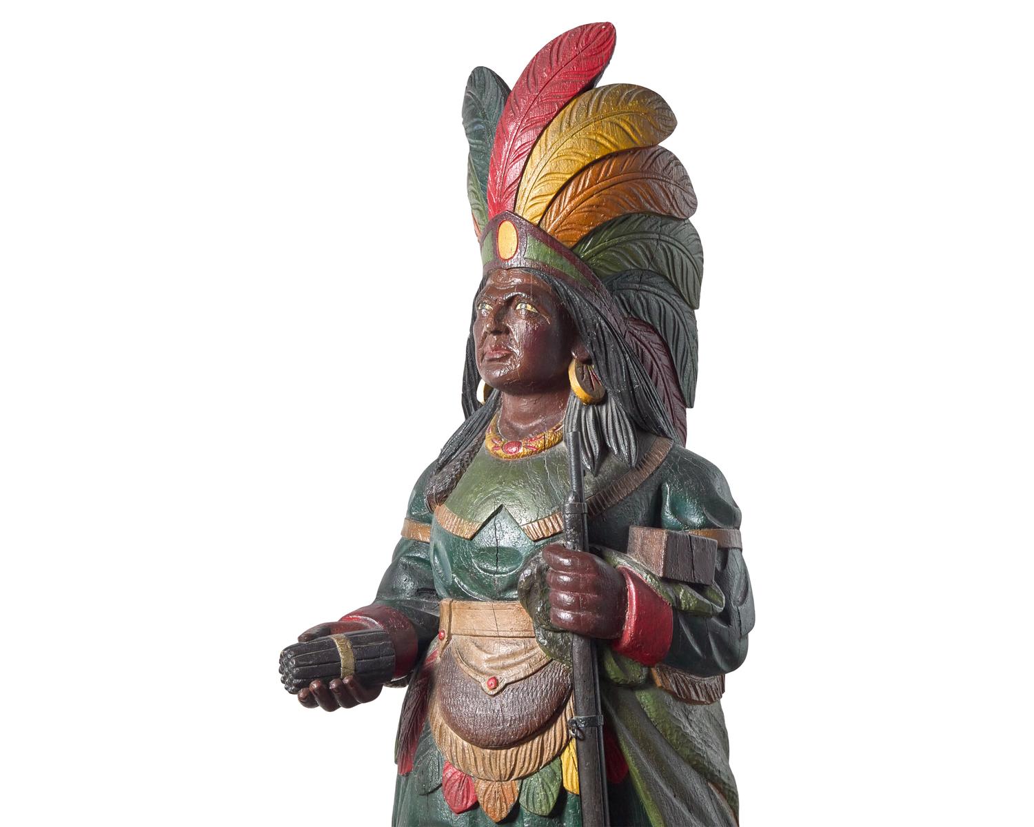 A Carved and Polychrome Painted Tobacconist Figure