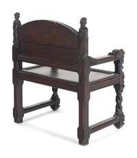 A William and Mary Style Carved Walnut Armchair