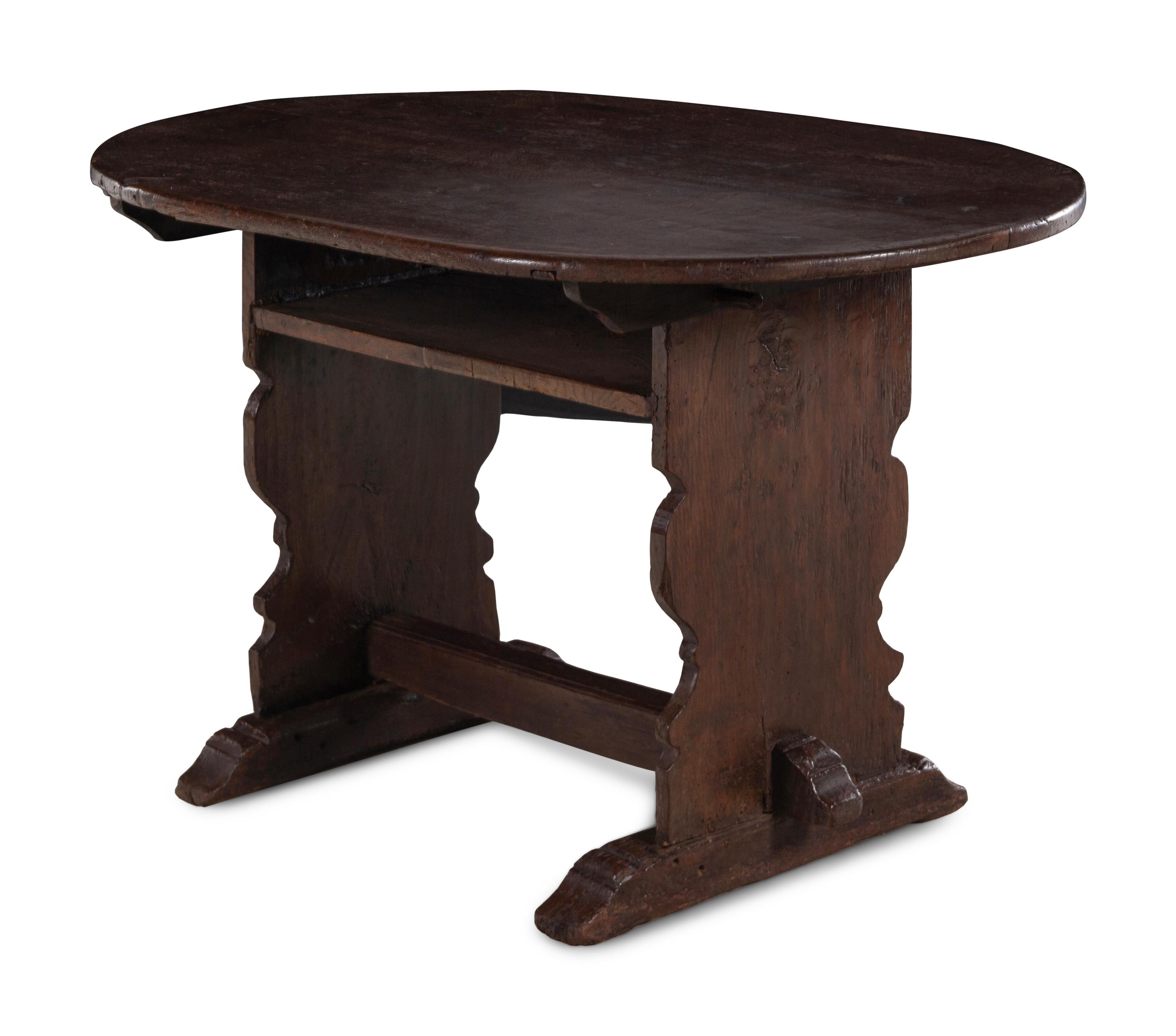 A Continental Oak Oval Trestle Table