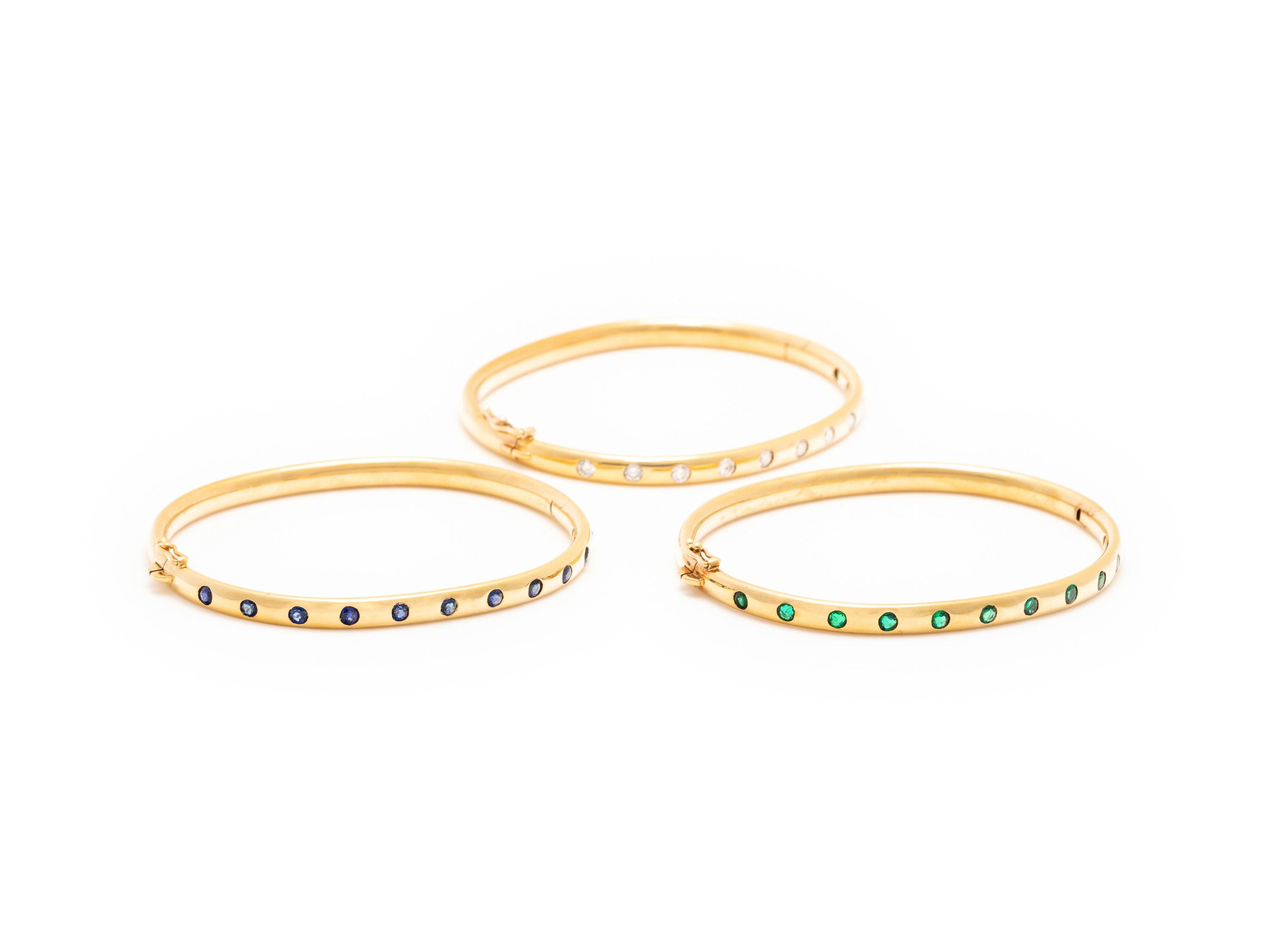 SCHLUGER, YELLOW GOLD, DIAMOND AND GEMSTONE BANGLE SET