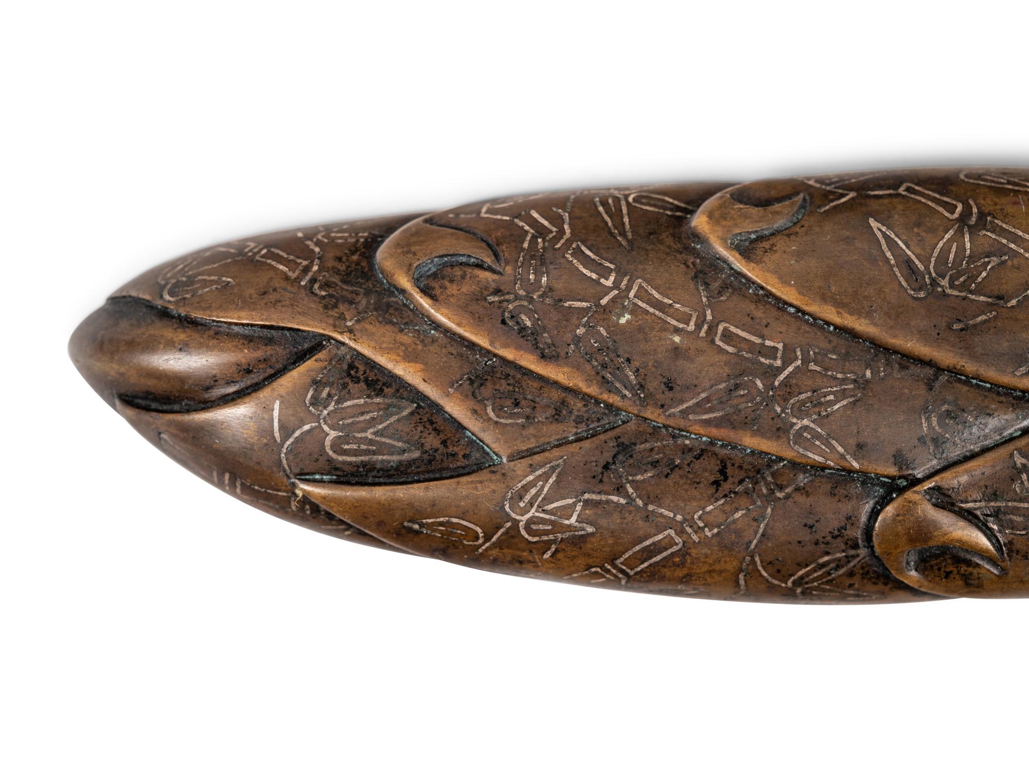 A Chinese Inlaid Bronze Bamboo Shoot-Form Paper Weight