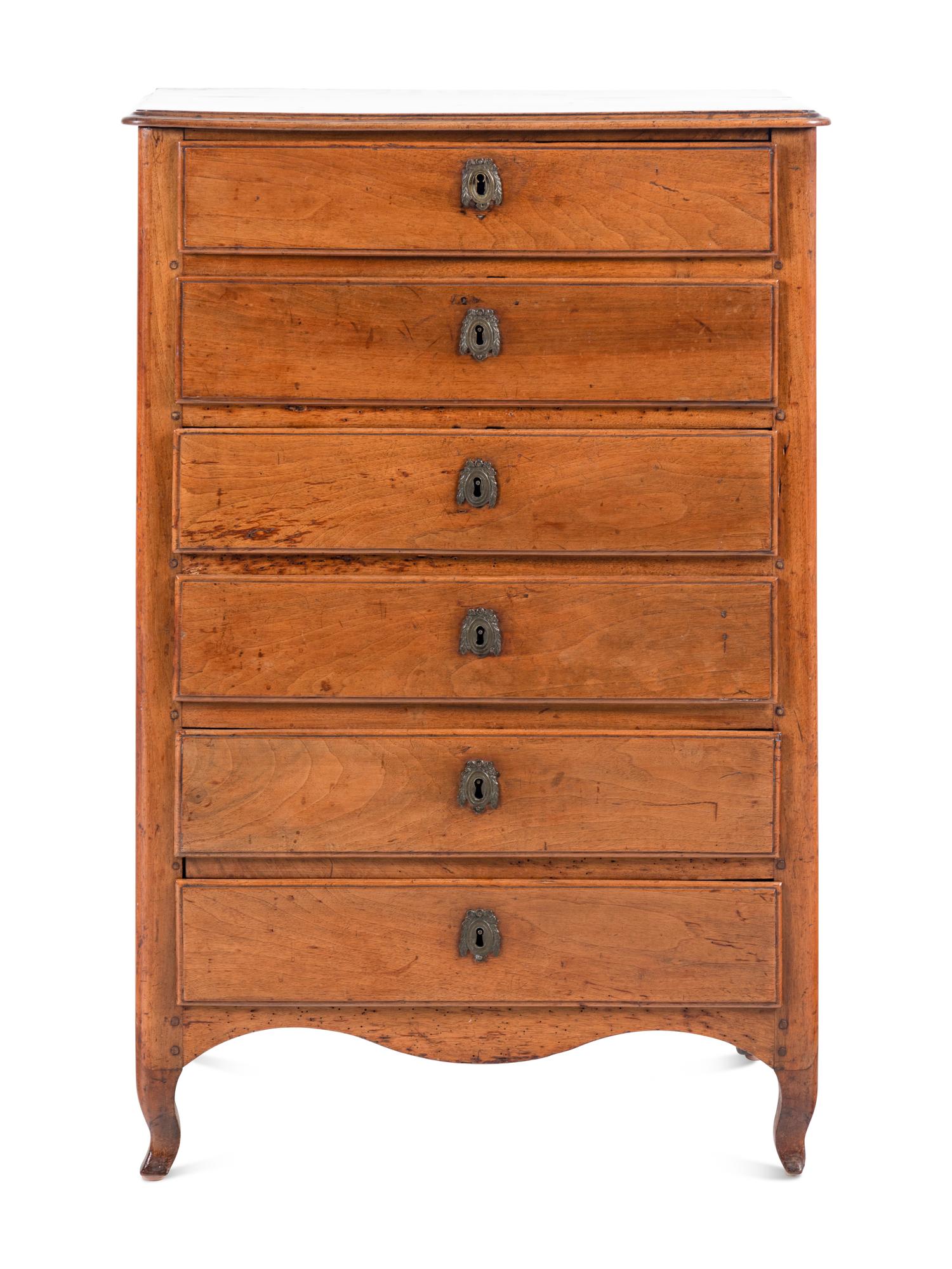 A Louis XV Provincial Walnut Semainier