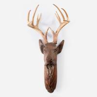 A Swiss Black Forest Carved Wood Stags Head late 19th/early 20th century