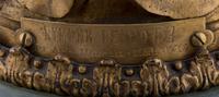 A French Onyx and Gilt Metal Clock Garniture