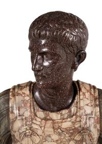 An Italian Carved Breccia Marble and Porphyry Bust of Augustus