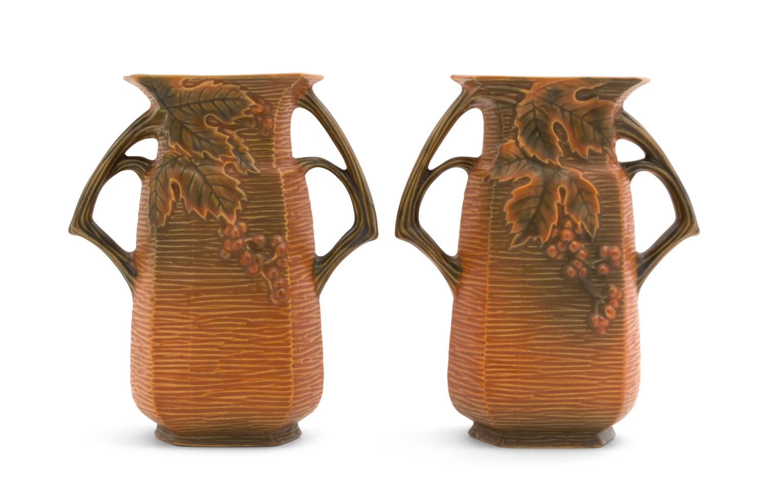 A Pair of Roseville Bushberry Pottery Vases Height 8 1/4 inches.