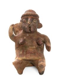 A Pre-Columbian Terracotta Figure, Nayarit, Height 6 inches.