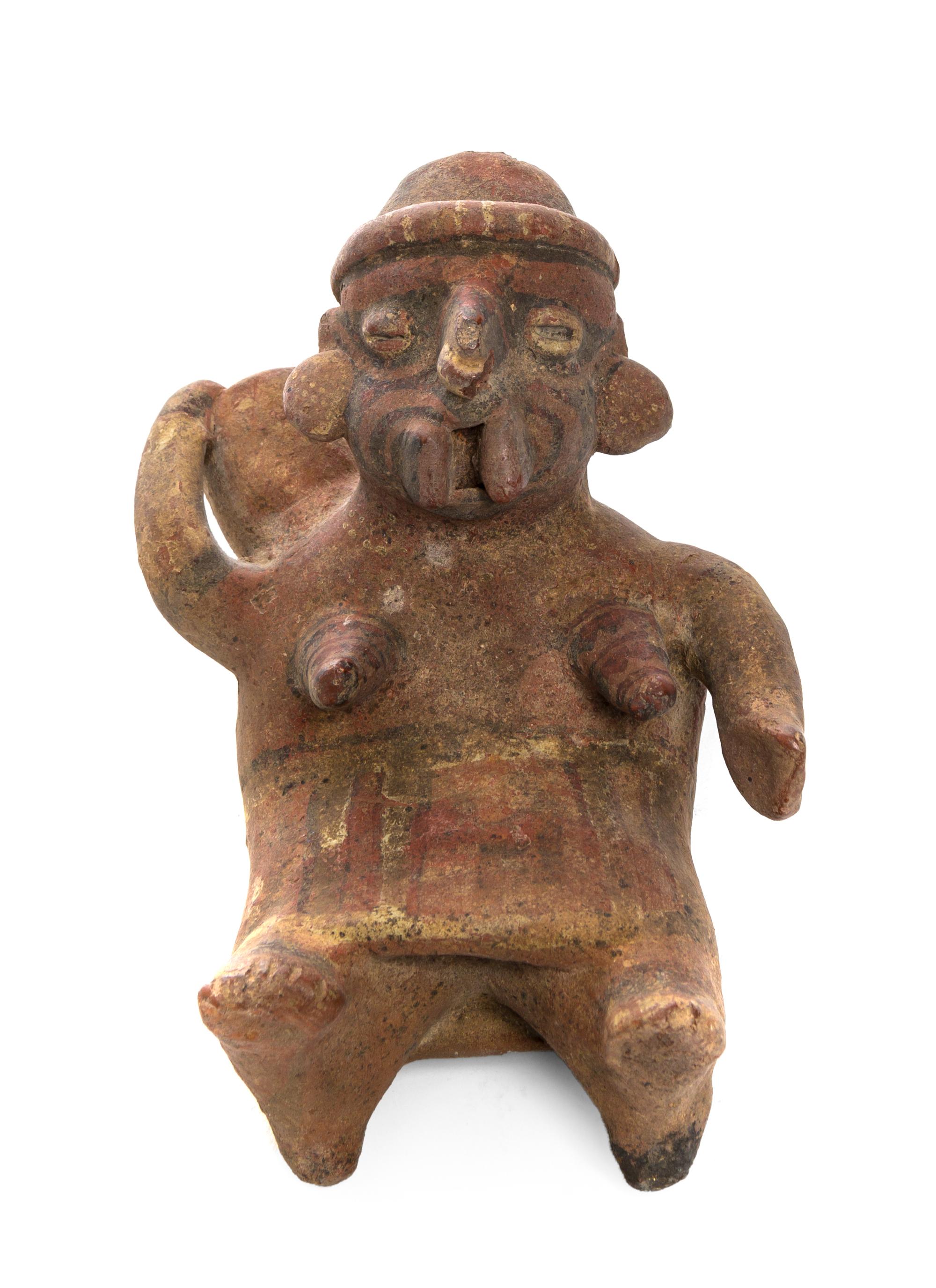 A Pre-Columbian Terracotta Figure, Nayarit, Height 6 inches.