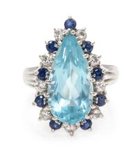A 14 Karat White Gold, Aquamarine, Diamond and Sapphire Ring, 4.00 dwts.