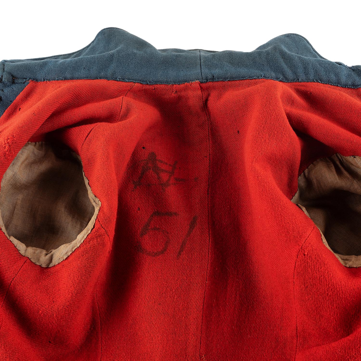 [MILITARIA]. Civil War-era enlisted overcoat with modifications.