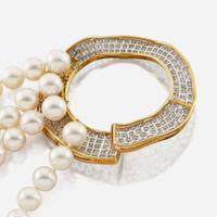 A cultured pearl, diamond, gold, and platinum necklace