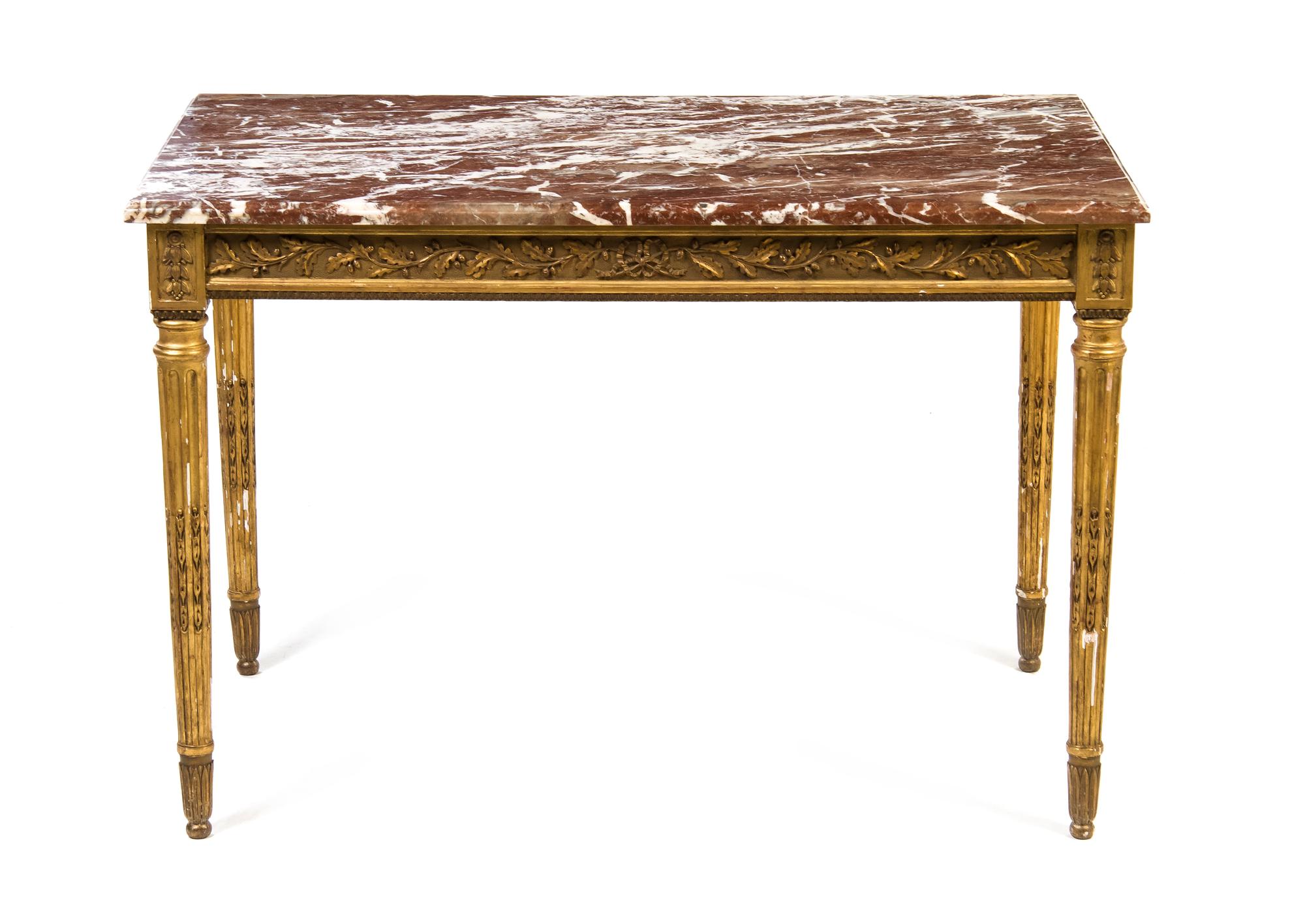A Louis XVI Style Giltwood Center Table, Height 28 1/2 x width 42 1/2 x depth 25 1/2 inches.