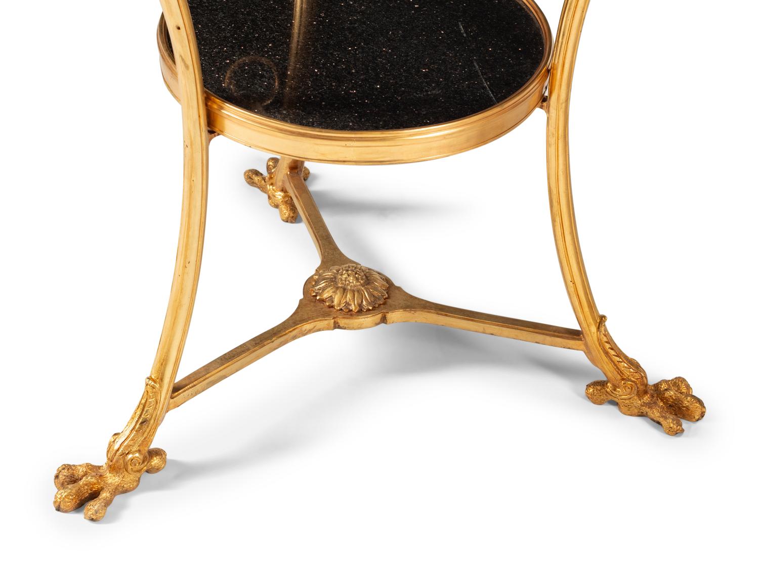 A Pair of Empire Style Gilt Bronze and Granite Side Tables