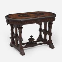 A Centennial inlaid, ebonized, and parcel gilt walnut center table Attributed to Kilian Bros. (active c. 1855-1920), New York, NY, circa 1876
