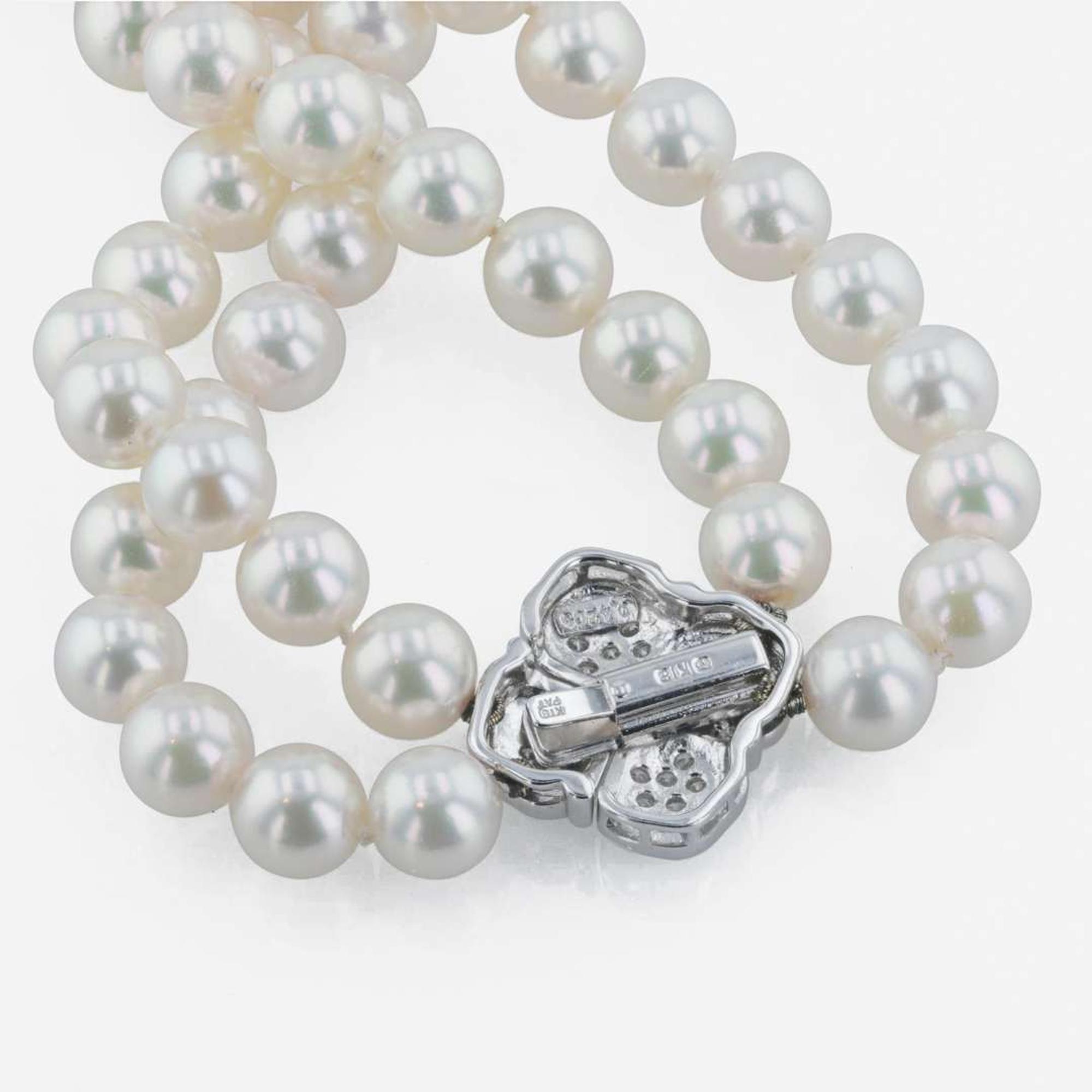 An 18K white gold, cultured pearl and diamond necklace, Mikimoto