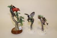 A Group of Three Royal Worcester Dorothy Doughty Birds. Height of tallest 12 inches.
