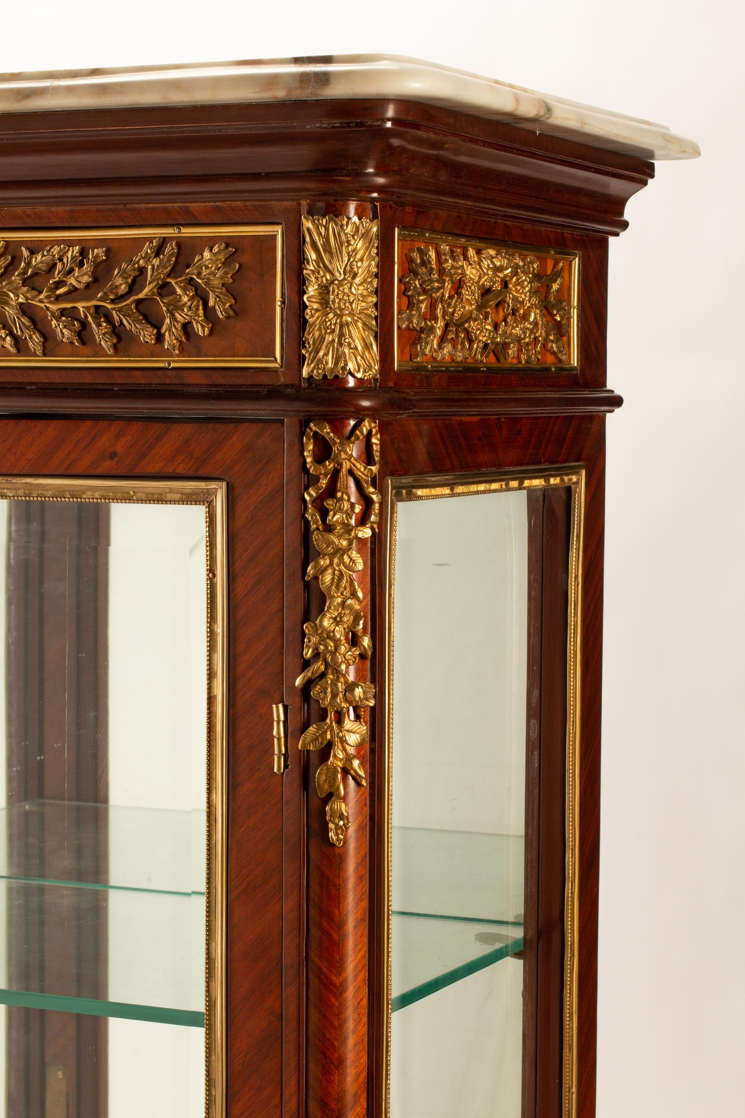 A Louis XVI Style Marble-Top Vitrine Cabinet
