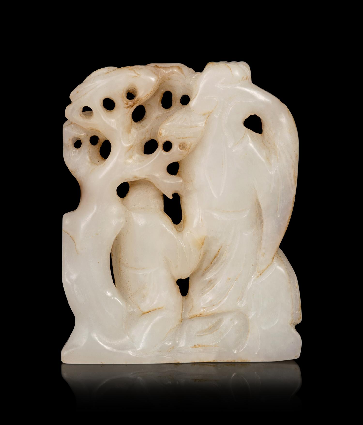 A Carved White Jade Figural Group