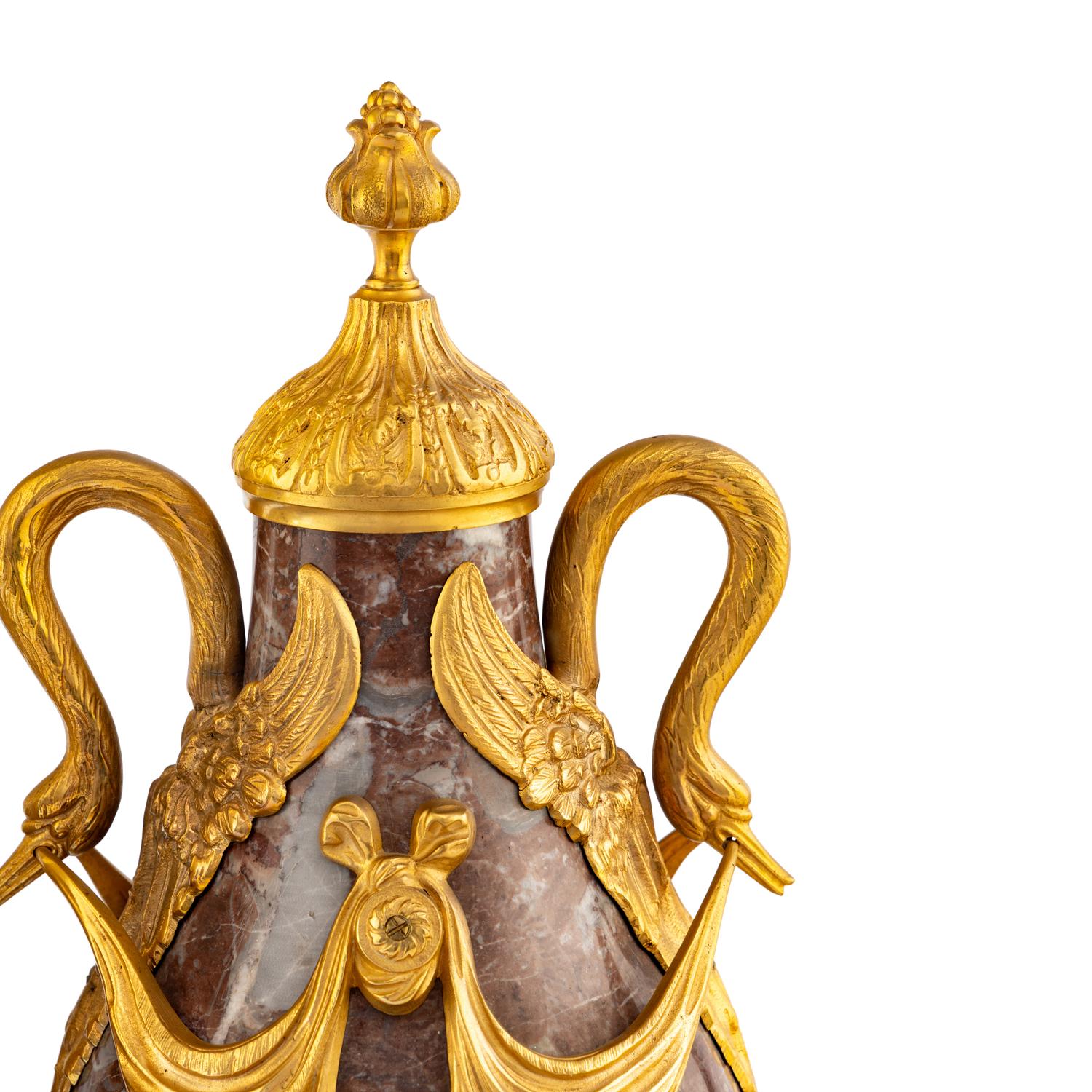 A Pair of Louis XVI Style Gilt Bronze Mounted Marble Urns