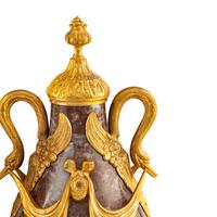 A Pair of Louis XVI Style Gilt Bronze Mounted Marble Urns