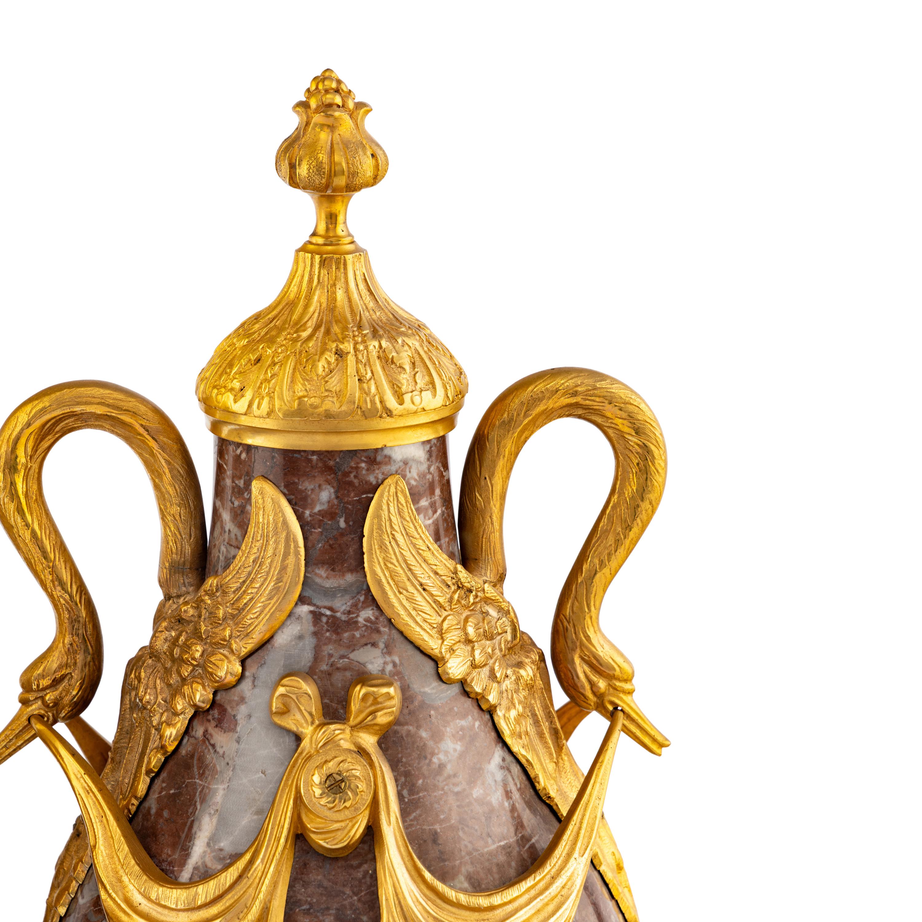 A Pair of Louis XVI Style Gilt Bronze Mounted Marble Urns