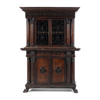 An Italian Renaissance Style Carved Walnut Cabinet